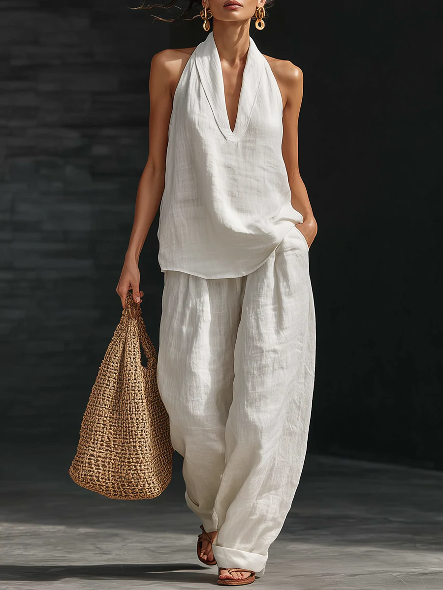 Zoë™ – Mouwloos ensemble en brede broek